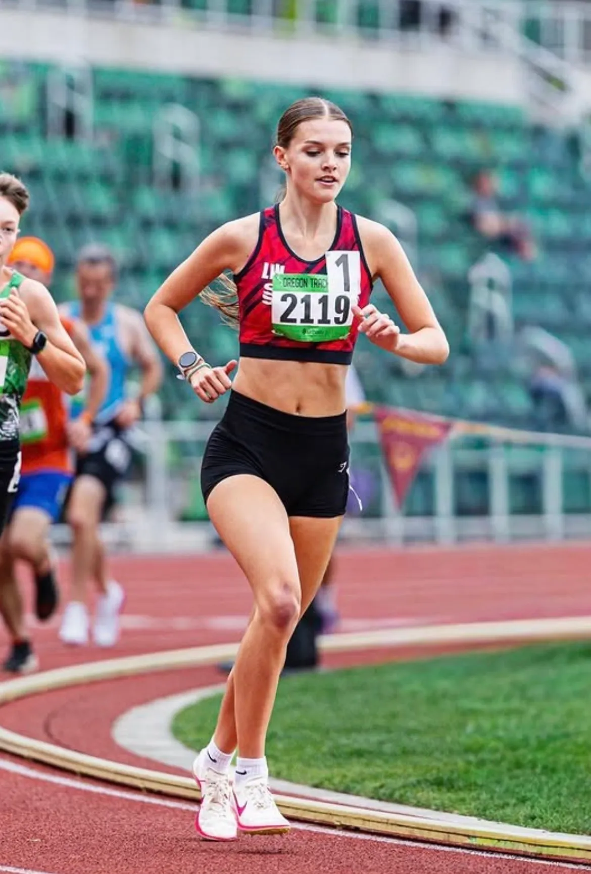 Junior athlete Layla Williams racing on the track