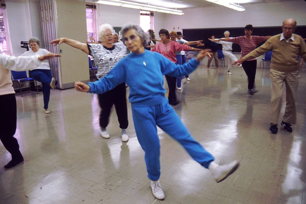 Older adults exercising together, representing balance, movement confidence and healthy ageing